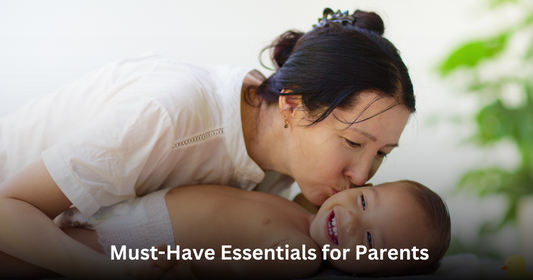 mother holding baby with essentials for changing diaper